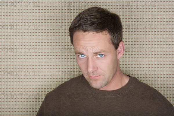 Studio portrait of mature man. Photo : Rob Lewine