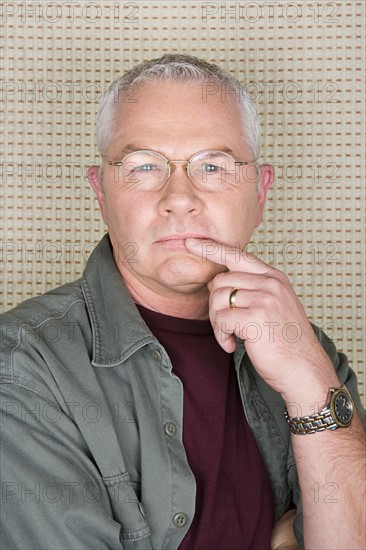 Studio portrait of senior man. Photo : Rob Lewine