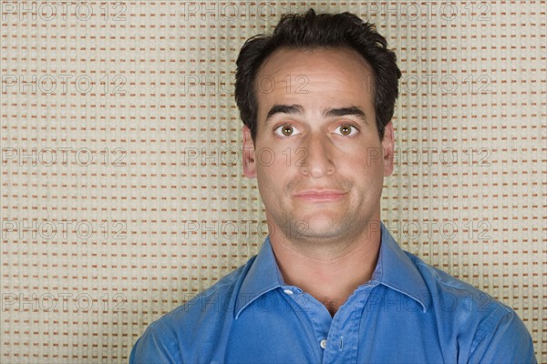 Studio portrait of mid adult man. Photo : Rob Lewine