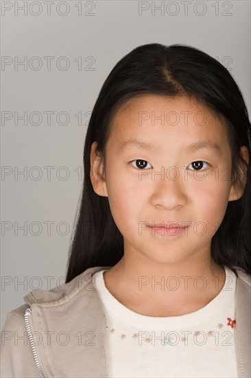 Studio portrait of teen (16-17) girl. Photo : Rob Lewine