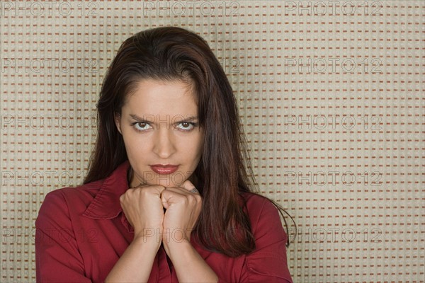 Studio portrait of mid adult woman. Photo : Rob Lewine