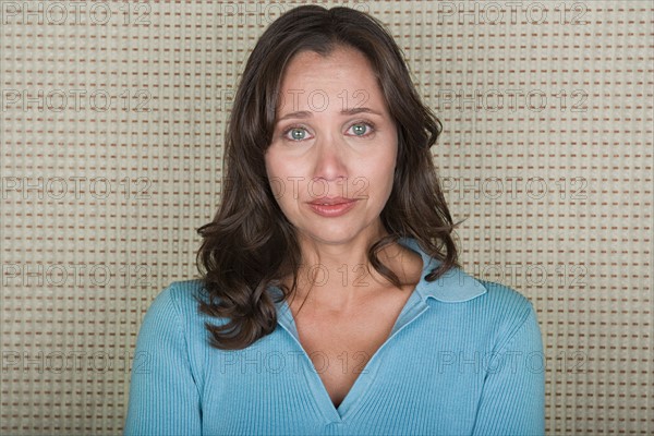 Studio portrait of mature woman. Photo : Rob Lewine