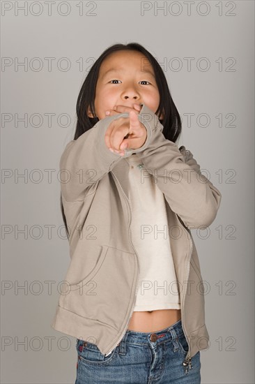 Studio portrait of teenage (16-17) girl. Photo : Rob Lewine