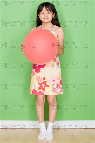 Studio shot portrait of teenage girl, full length. Photo : Rob Lewine