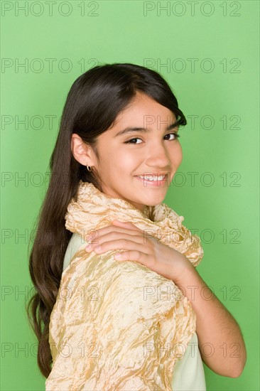 Studio shot portrait of teenage girl, head and shoulders. Photo : Rob Lewine