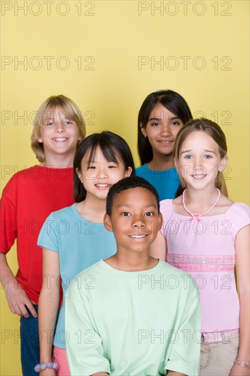 Studio shot portrait of five teenagers, waist up. Photo : Rob Lewine