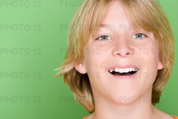 Studio shot portrait of teenage boy, close-up. Photo : Rob Lewine