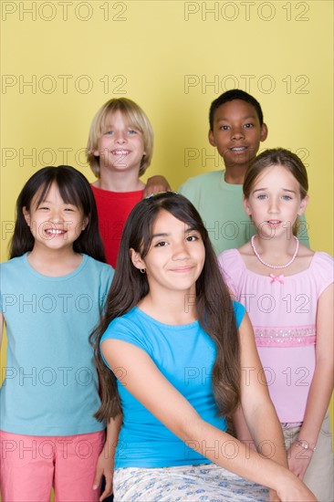 Studio shot portrait of five teenagers, three quarter length. Photo : Rob Lewine
