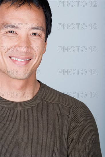 Studio shot portrait of mature man, head and shoulders. Photo : Rob Lewine