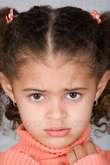 Studio shot portrait of girl, close-up. Photo : Rob Lewine