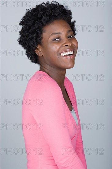 Studio portrait of confident mid adult woman. Photo : Rob Lewine