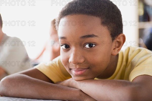 Portrait of boy in classroom. Photo : Rob Lewine