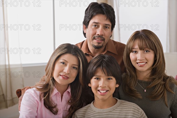 Portrait of smiling family. Photo : Rob Lewine