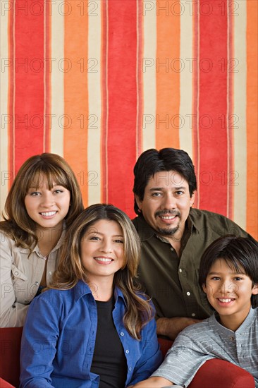 Portrait of smiling family. Photo : Rob Lewine