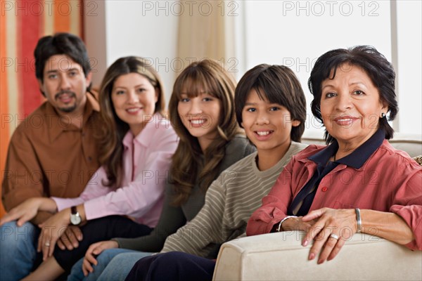 Portrait of smiling family. Photo : Rob Lewine