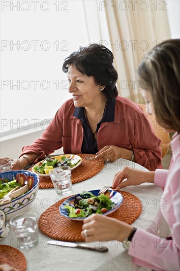 Family having meal together. Photo : Rob Lewine