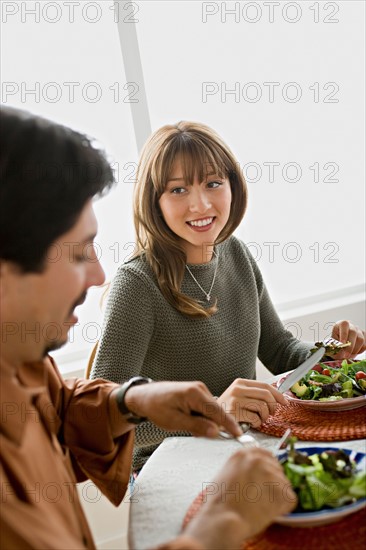 Family having meal together. Photo : Rob Lewine