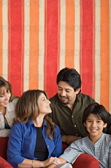 Portrait of smiling family. Photo : Rob Lewine