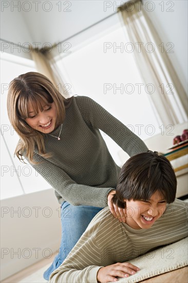 Brother and sister fighting together. Photo : Rob Lewine