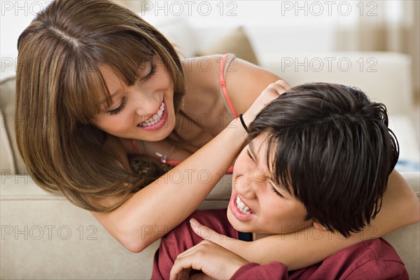 Brother and sister fighting together. Photo : Rob Lewine