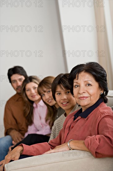 Portrait of smiling family. Photo : Rob Lewine