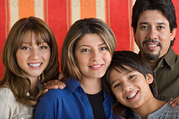 Portrait of smiling family. Photo : Rob Lewine