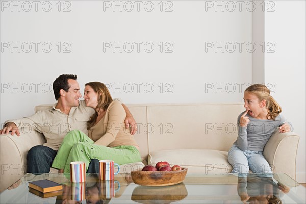 Family in living-room. Photo : Rob Lewine