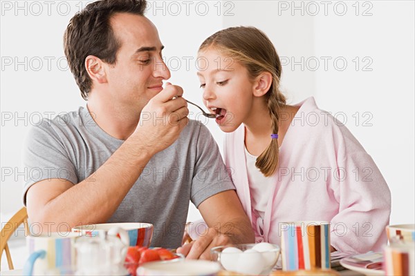 Father with daughter having breakfast. Photo : Rob Lewine