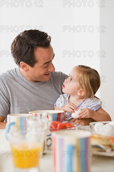 Father with daughter having breakfast. Photo : Rob Lewine