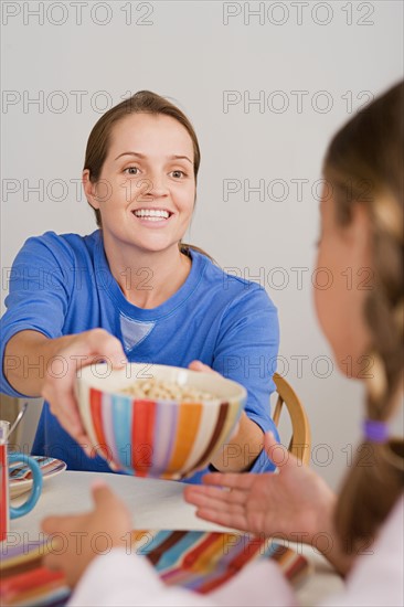 Mother and daughter having breakfast. Photo : Rob Lewine