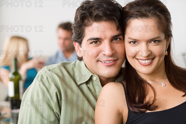 Couples at home party. Photo : Rob Lewine