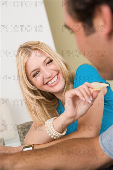 Happy couple at home party. Photo : Rob Lewine