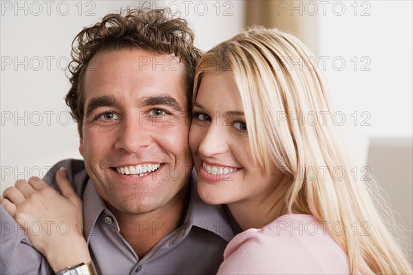 Portrait of smiling couple. Photo : Rob Lewine