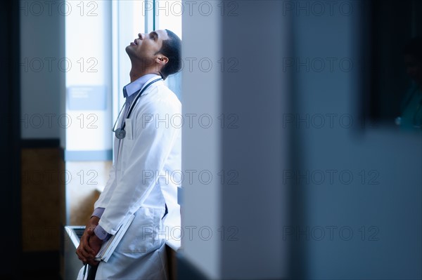 Doctor in corridor.