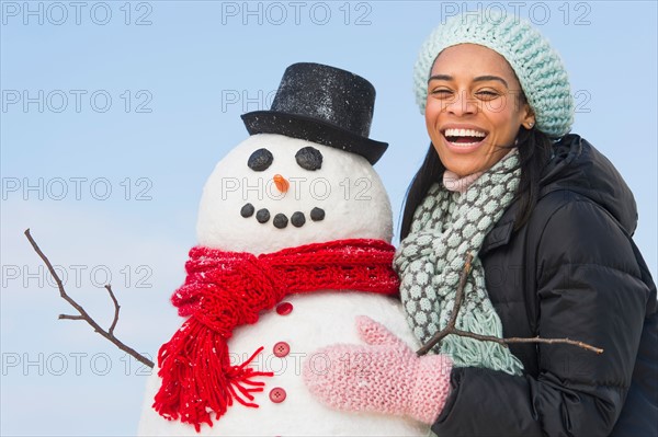 Portrait of woman with snowman.