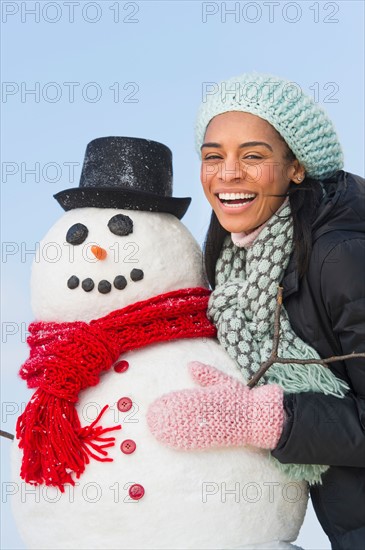 Portrait of woman with snowman.