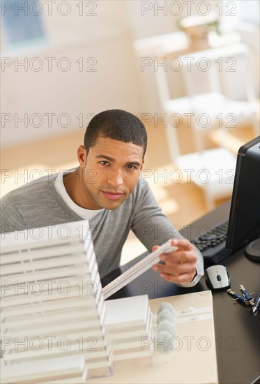 Portrait of male architect in office.