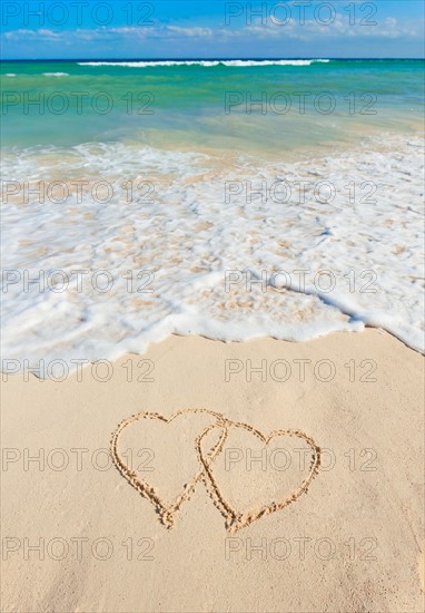 Mexico, Yucatan. Heart drawing in sand on beach.