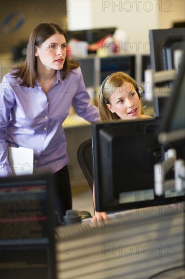 Traders at trading desk.