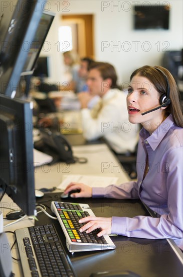 Traders at trading desk.