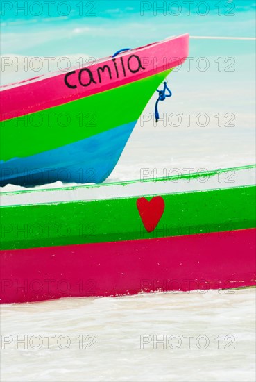 Colorful boats on beach.