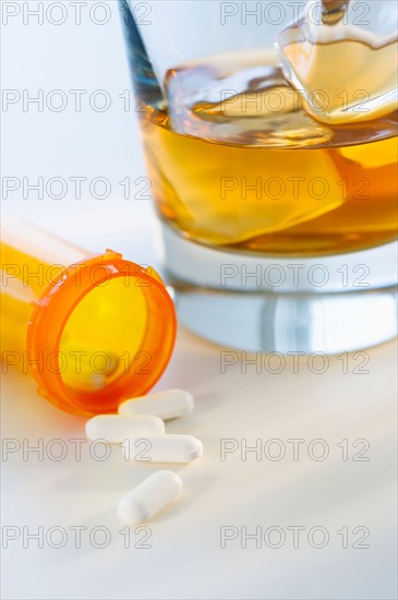 Pills and alcohol, studio shot.