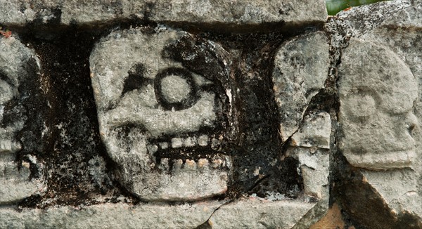 Mexico, Yucatan, Chichen Itza. Mayan carvings representing human skulls.