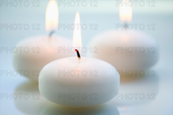 Close-up of white candles.