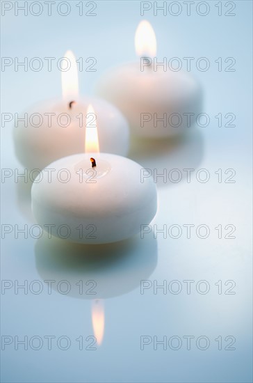 Studio shot of white candles.