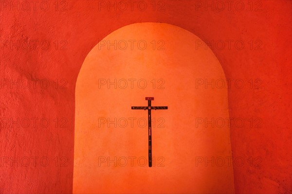 Mexico, Yucatan, Valladolid. Valladolid, Crucifix on wall.