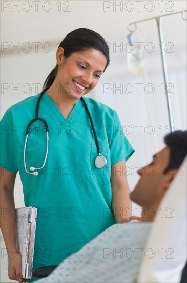 Doctor smiling to patient.