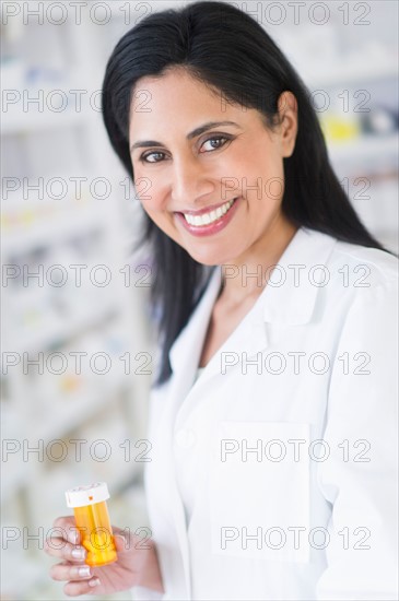 Pharmacist in drugstore.