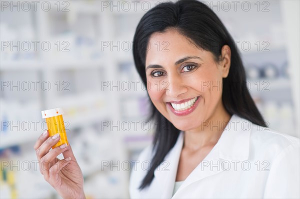 Pharmacist in drugstore.