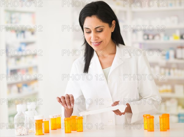 Pharmacist preparing medicines.